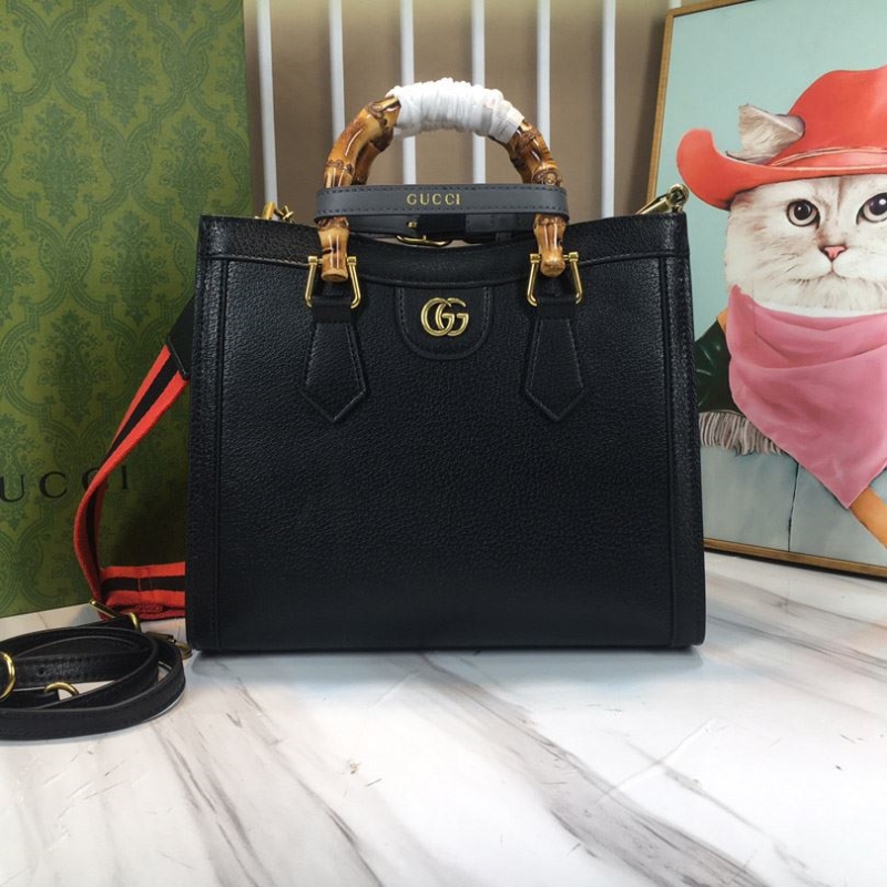 G*u*i top handle bags